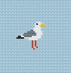 a cross stitch seagull with an orange beak and black legs on a blue background