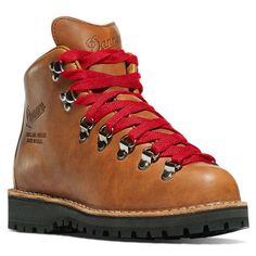 a pair of brown boots with red laces