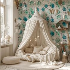 a canopy bed in the corner of a room with blue and white circles on the wall