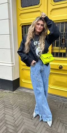 Sweatshirt Heels Outfit, Statement Bag Outfit, Edgy Spring Streetwear Cargo Pants, Casual Dinner With Friends Outfit, Playful Fall Streetwear Tops, Spring Streetwear Cargo Jeans, Boho Street Style 2024, Funky Fall Streetwear Outerwear, Arcade Outfit