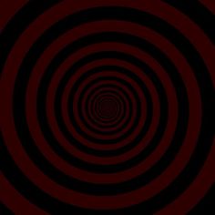 an abstract black and red background with circles in the center, which are spirally arranged