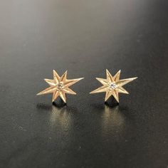 Estrella gold studs, Gold star earrings starburst studs 10k gold diamonds for the holidays or any days! Perfectly tiny eight pointed stars are matte finished and set with genuine white brilliant cut .02 pt diamonds! They are beautifully substantial and comfortable to wear. Included are the push backs and a lovely gift box. White gold, rose gold and sterling silver are also available options. Shine on! Earrings Starburst, Gold Star Earrings, Studs Gold, Gold Star, Shine On, Philadelphia Pa, Star Earrings, Gold Stars, Gold Studs