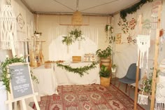 a room filled with lots of plants and decorations