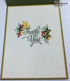 a thank you card with flowers on it