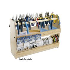 a wooden rack with scissors and other tools on it's sides in front of a white background