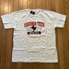 White Virginia Tech Tshirt, Youth Xl, Brand New White Fan Apparel Shirt With Letter Print, White Letter Print Shirt For Fan Apparel, White Letter Print Shirt For Fans, White Collegiate Shirt With Graphic Print, White Crew Neck Shirt Fan Apparel, White Cotton Shirt With School Spirit, White Crew Neck Shirt For Fans, White Cotton Shirt With School Spirit Style, White Screen Print T-shirt For School