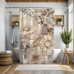 a bathroom with a shower curtain that has flowers on it and plants in the corner