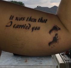 a person with a tattoo saying it was then that i carried you