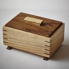 a wooden box sitting on top of a table