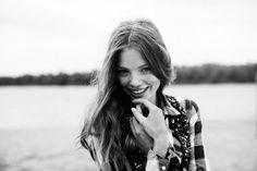 black and white photograph of a woman smiling