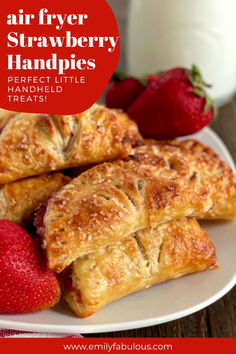 strawberry hand pies on a white plate with strawberries next to it and the words, air fryer strawberry handpies perfect little treats