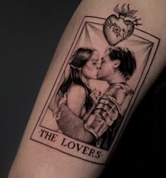 a couple kissing each other with the words, the lovers on their arm behind them