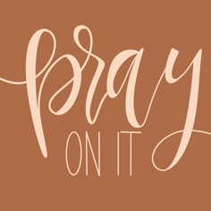 the words pray on it are in white letters against a brown background with pink lettering