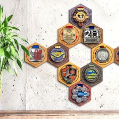 a potted plant sitting on top of a wooden shelf next to a wall mounted clock