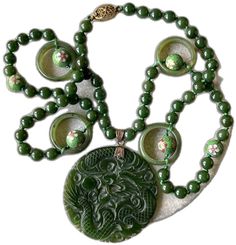 Bohemian Single Strand Round Jewelry, Traditional Jade Necklace With Round Pendant, Bohemian Round Jade Jewelry, Bohemian Jade Round Pendant Jewelry, Green Pendant Jewelry With Lobster Clasp, Adjustable Round Jade Necklaces, Green Amulet Style Round Bead Jewelry, Green Amulet-style Round Bead Jewelry, Green Round Bead Amulet Jewelry