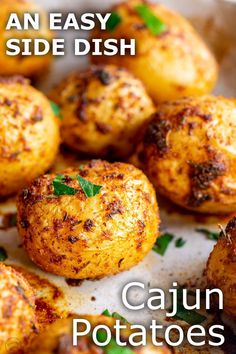 there is a close up view of some baked potatoes on the plate with text that reads, an easy side dish cajun potatoes