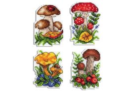 four cross stitch designs with mushrooms and flowers