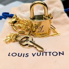 Authentic Louis Vuitton Padlock (#319) And Key In Solid Brass. Padlock Is Pre-Loved But In Excellent Condition With Very Light Scratches, Polished And Shiny. Both Necklaces Are Brand New, Never Worna Duplicate Of My Favorite Set Because I Get So Many Compliments! Padlock Necklace: 3mm Italian Solid 14k Gold Over 925 Sterling Silver Paperclip Chain, 18 Inches, Hypoallergenic & Comfortable. Key Necklace: 2mm 18k Gold Vermeil Plated Cable Chain Over 925 Sterling Silver, 18 Inches.Both Chains Are St Key Chains Necklaces, Padlock Necklace, Louis Vuitton Jewelry, Felt Jewelry, Key Necklace, Jewelry Bags, Authentic Louis Vuitton, Cable Chain, Gold Vermeil