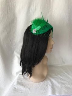 Perfect time for Wedding look, This is a classy vintage inspired 1950s - 1960s Green half hat with a modern touch perfect as a bridal fascinator hat, wedding hat, tea party hat, church hat or any other special occasion. This is a green felt headpiece create by hand and has a wire base that can fit any head size comfortably. WHAT MAKES THIS SO UNIQUE I form each piece while on my head to see how it fits and looks and then take it off and hand sew each piece. I design it to wear both ways so there Adjustable Gatsby Mini Hats For Vintage Events, Flapper-style Hat For Vintage Events, Fitted Flapper Hat For Vintage Events, Fitted Gatsby Mini Hats For Vintage Events, Flapper Style Fascinator For Vintage Events, Gatsby Style Hat For Vintage Events, Vintage Gatsby Style Hat Headpiece, Fitted Costume Hat With Pinched Crown For Church, Vintage Cloche Costume Hat For Party