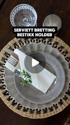 an image of a table setting with silverware and napkins on the placemat