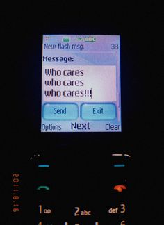 a cell phone that is turned on with the message'who cares who cares? '