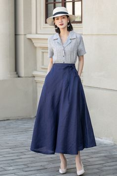 A gorgeous blue linen wrap skirt that exudes effortless style and sophistication. Perfect for a day out at the beach or a casual brunch with friends. Pair it with a simple white top and sandals for a chic summer look. 💙 

SKU 4903

#BlueLinenSkirt #WrapSkirt #SummerFashion #CasualStyle Elegant Linen Gathered Skirt, Fitted Linen Wrap Skirt With Lining, Summer Wrap Skirt With Tie Waist For Work, Elegant Long Linen Wrap Skirt, Linen Wrap Skirt For Spring Workwear, Elegant Blue Wrap Skirt For Summer, Elegant Blue Summer Wrap Skirt, Elegant Linen Wrap Skirt, Linen Flowy Dress With Lined Skirt