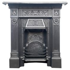 an old fashioned fireplace with ornate carvings on the front and sides, isolated against a white background