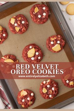 red velvet oreo cookies on a cookie sheet with white chocolate chips and marshmallows