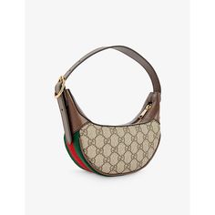 Find GUCCI Ophidia Mini Canvas Shoulder Bag on Editorialist. | Gucci canvas shoulder bag100% canvas; trims 100% leatherZip closureAdjustable top-handle, brand plaque at side, branded stripe trim, all-over brand pattern, one main compartment, keyring at interior, two interior card slots, linedHeight 15cm, width 20cm, depth 5cmWipe with a clean, dry clothMade in ItalyComes with a dust bag Gucci Mini Bag, Brand Pattern, Gucci Mini, Gucci Ophidia, Gg Monogram, Gucci Shoulder Bag, Mini Canvas, Canvas Shoulder Bag, Monogram Canvas