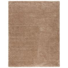 a beige rug on a white background with no one in the room to see it