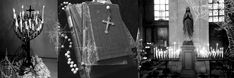 black and white photograph of the interior of a church with candles in front of it