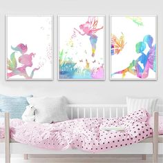 three paintings on the wall in a child's room