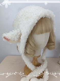 a wig is wearing a white furry hat