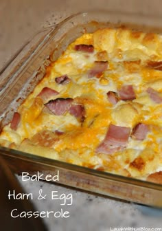 baked ham and egg casserole in a glass baking dish on a counter top