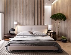 a modern bedroom with wood paneled walls and flooring, along with a large bed