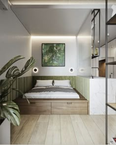 a bed sitting in the middle of a bedroom next to a plant on top of a wooden floor