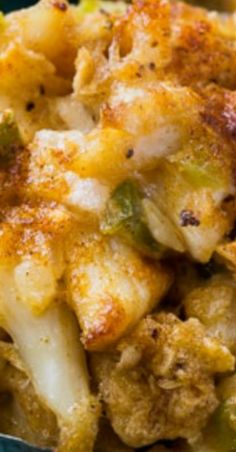 a casserole dish with potatoes and broccoli is shown in a green bowl