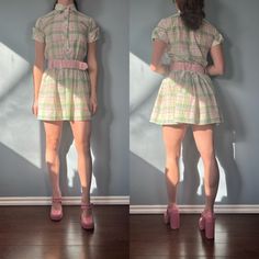 "The cutest 70s green & pink plaid mini dress with a chunky pink belt! This dress was most likely a children's dress that the previous owner shortened. Will fit a women's small! Size Small  Brand - Peaches 'n Cream Era - Early 70s Great Vintage Condition (FLAW - one stain on the front of the dress below the belt - see last photo) Made in USA Measurements LAYING FLAT Bust - 17\" Waist -  14\" - 15\" Hips - 25\" Length - 32\" Please let me know if you have any questions!" Collared Mini Dress, 70s Plaid, 70s Green, Plaid Mini Dress, 70s Look, Pink Belt, Red Velvet Dress, Hawaiian Dress, Childrens Dress