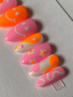 "Hand painted orange and pink mismatched gel press on nails with yin yang, smiley face, floral, abstract swirl design. Nails pictured are STILETTO SHORT shape. PLEASE READ: I sell nail sizing kits so you can try the sizes at home to find your perfect fit before ordering if you choose. You can find this on my shop under \"NAIL SIZING KIT.\" OR Use the nail sizing chart instructions from the photos to measure your nails. Then choose from the nail size options XS, S, M, or L. If your nails do not f Spirit Week Nails, Light Pink And Orange Nails, Pink And Orange Star Nails, Happy Birthday Nails Designs, 70s Nails Retro Pink, Happy Face On Nails, Pastel Groovy Nails, Swirl Design Nails, Pink And Orange Flame Nails