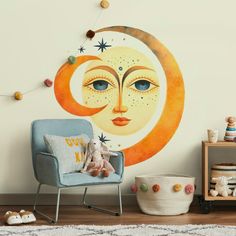 a child's room with a moon and stars painted on the wall