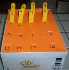 an orange and white box with numbers on it