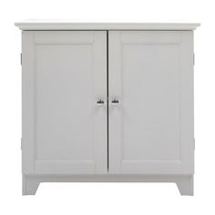 a white cabinet with two doors and drawers