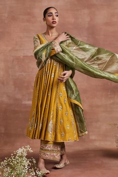 Shop for these amazing collections of Yellow Moonga Silk Roop Zari Anarkali Palazzo Set For Women by Sue Mue online at Aza Fashions. Navratri Silk Anarkali Set With Dabka Details, Yellow Slub Silk Dupatta With Dabka Work, Traditional Silk Anarkali Set With Gota Work, Bollywood Style Gold Slub Silk Anarkali Set, Dabka Silk Anarkali Set For Navratri, Silk Anarkali Set With Dabka For Navratri, Designer Anarkali Dupatta With Traditional Drape, Yellow Slub Silk Anarkali Set With Dupatta, Designer Wear Anarkali Dupatta With Traditional Drape