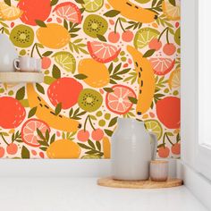 an orange and green fruit wallpaper in a kitchen