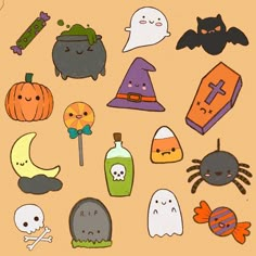 a collection of halloween stickers on a brown background