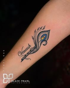 a woman's arm with a tattoo on it