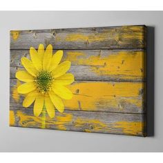 a yellow flower painted on an old wood planks wall art print by design express