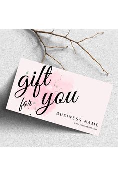 a business card with the words gift for you on it and a branch in front