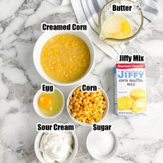 ingredients to make corn pudding laid out on a marble counter