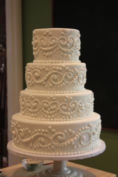 a white wedding cake is shown on the instagram page for an appliance